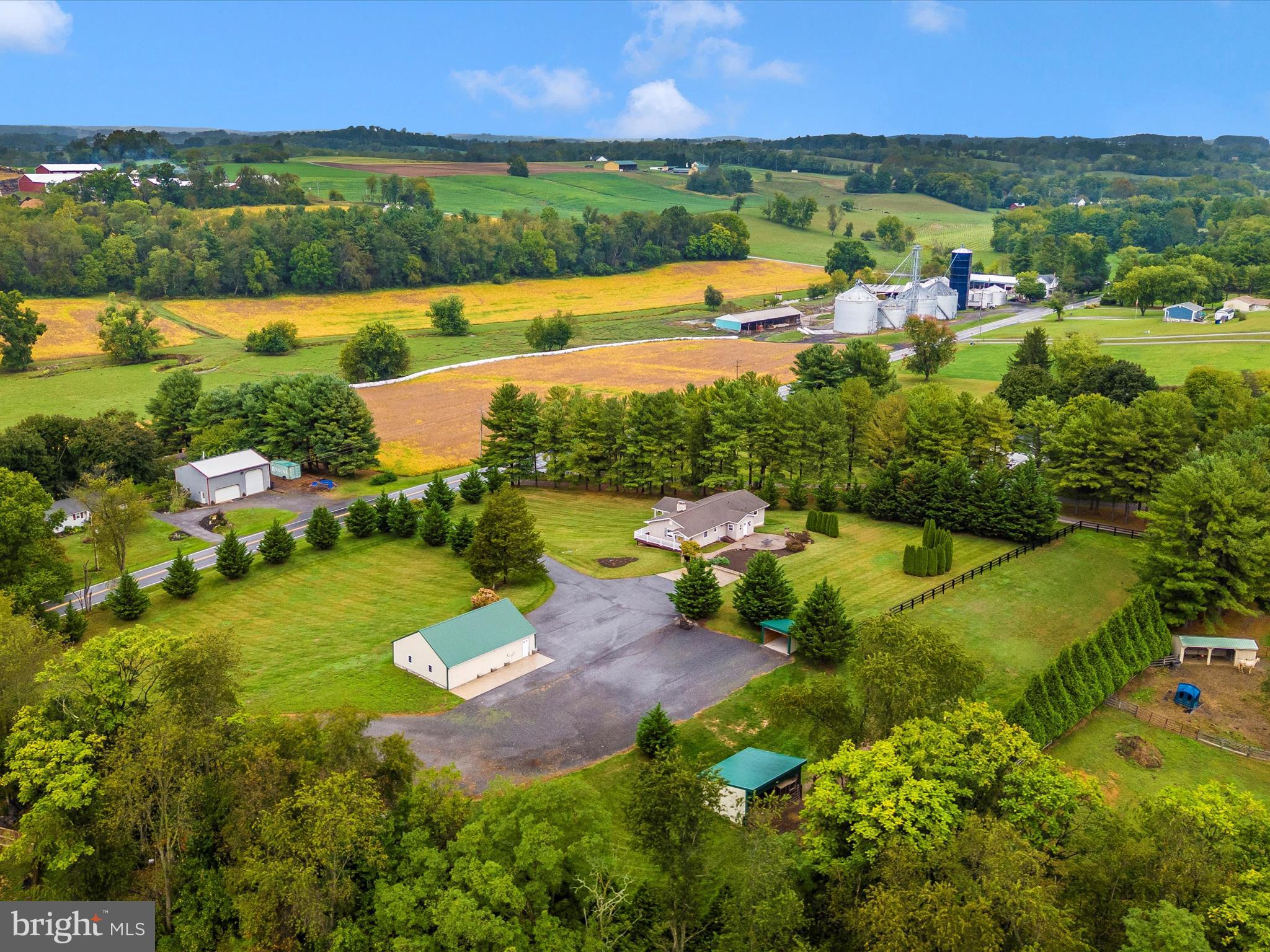 8429 Woodville Road Mount Airy, MD 21771 - Photo 62 of 75 an aerial view of a houses with a yard and lake view