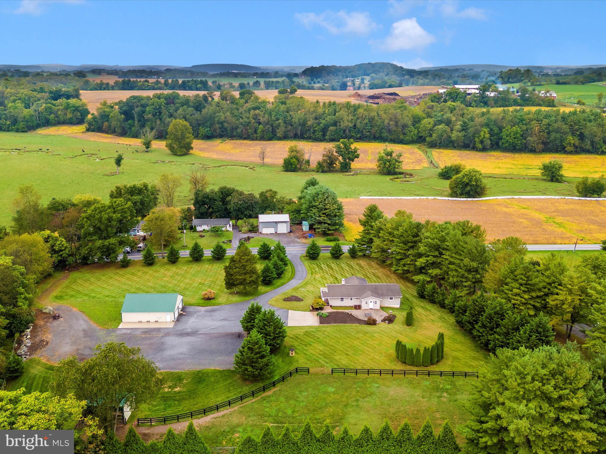 8429 Woodville Road Mount Airy, MD 21771 - Photo 63 of 75 an aerial view of a house with a swimming pool yard and outdoor seating