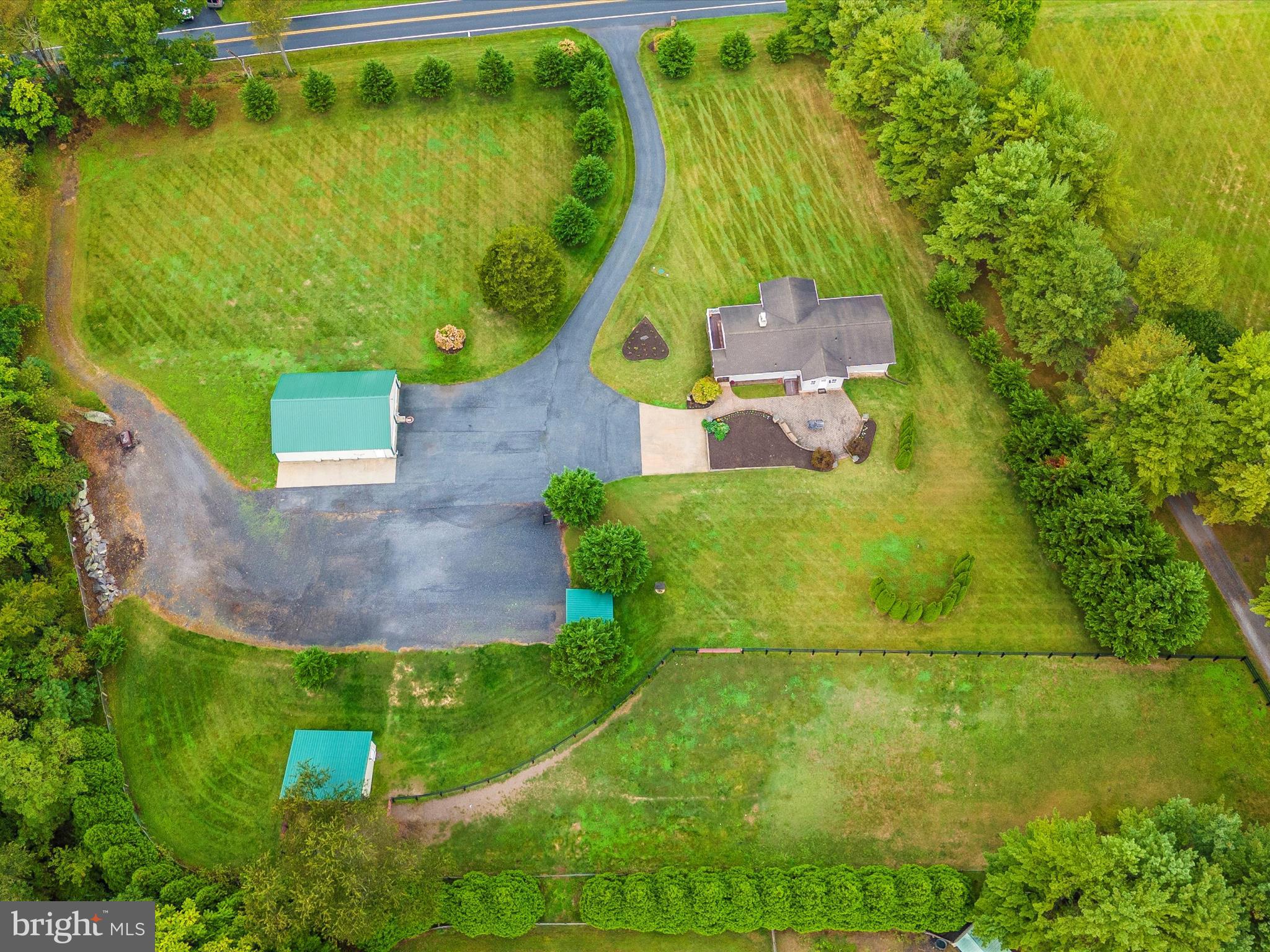 8429 Woodville Road Mount Airy, MD 21771 - Photo 65 of 75 an aerial view of a house with a yard and lake view