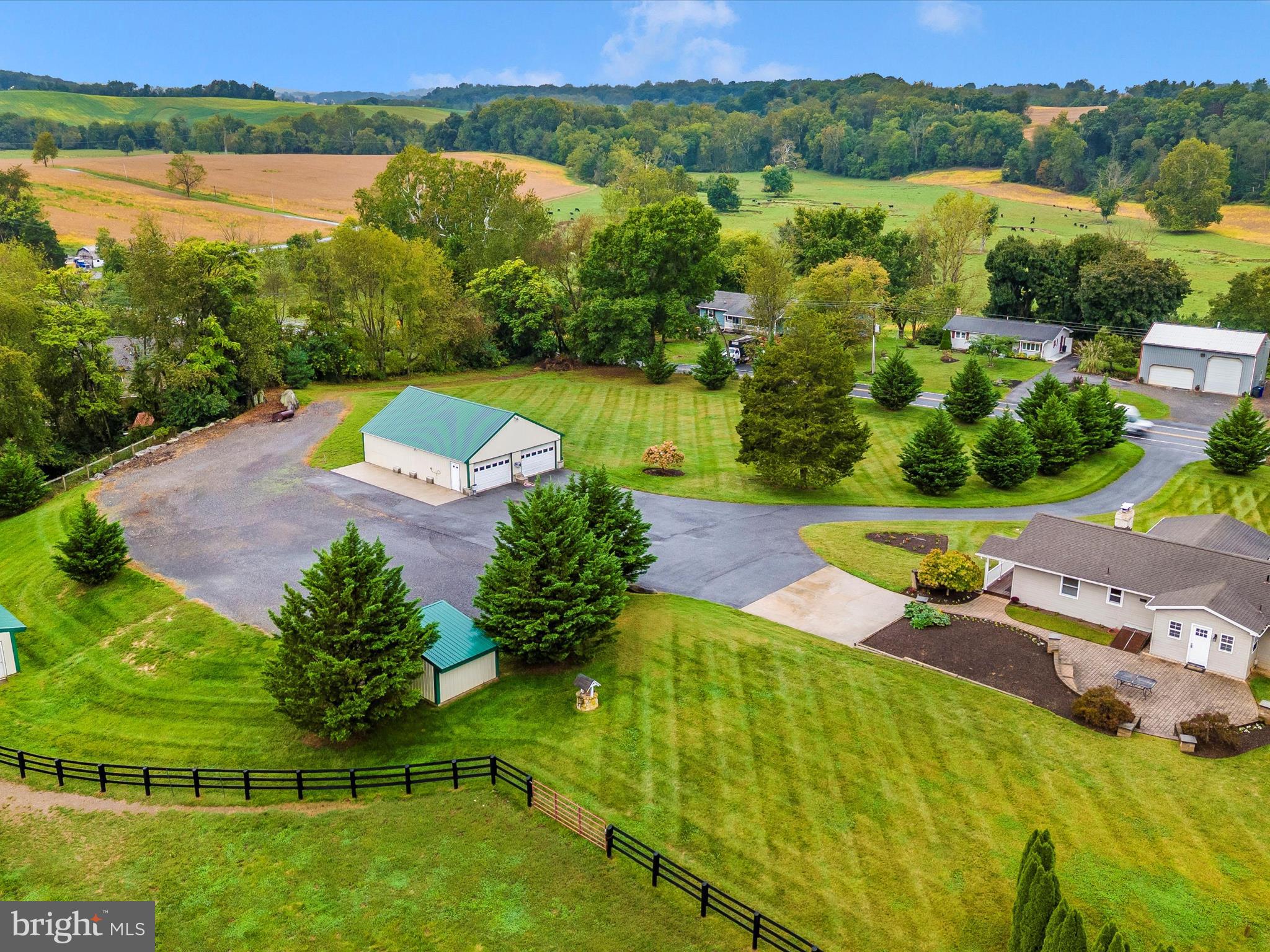 8429 Woodville Road Mount Airy, MD 21771 - Photo 66 of 75 an aerial view of a house with a lake view
