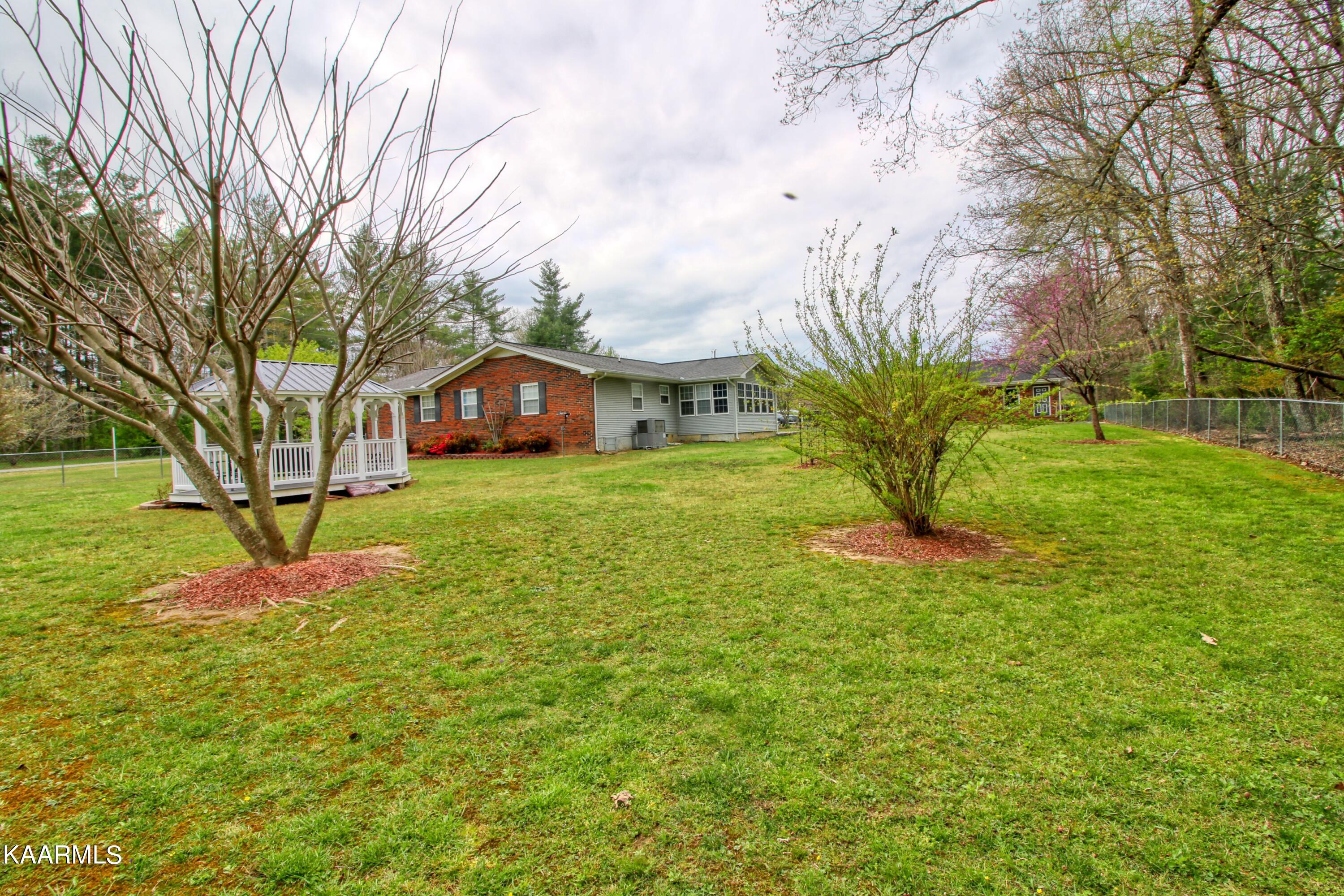 272 Pine Grove Road Crossville, TN 38571 - Photo 34 of 36 backyard:backofhouse