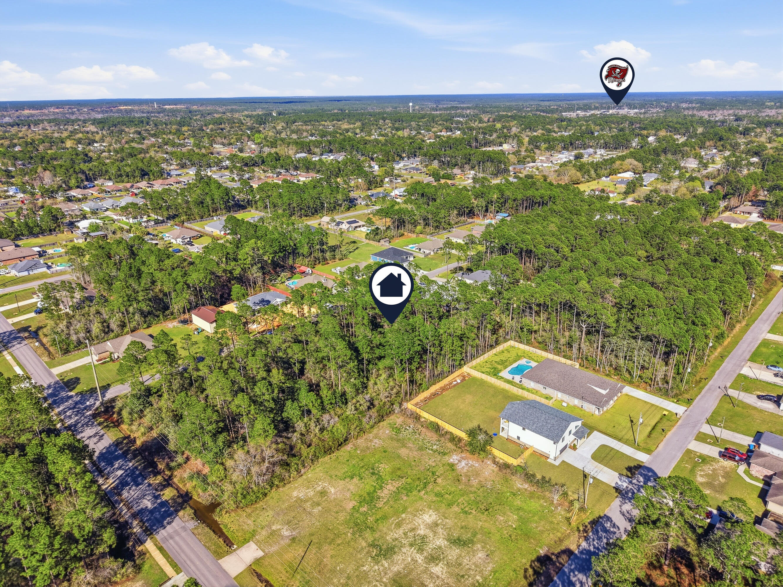 8103 Miranda Street Navarre, FL 32566 - Photo 4 of 12 a view of a tennis court