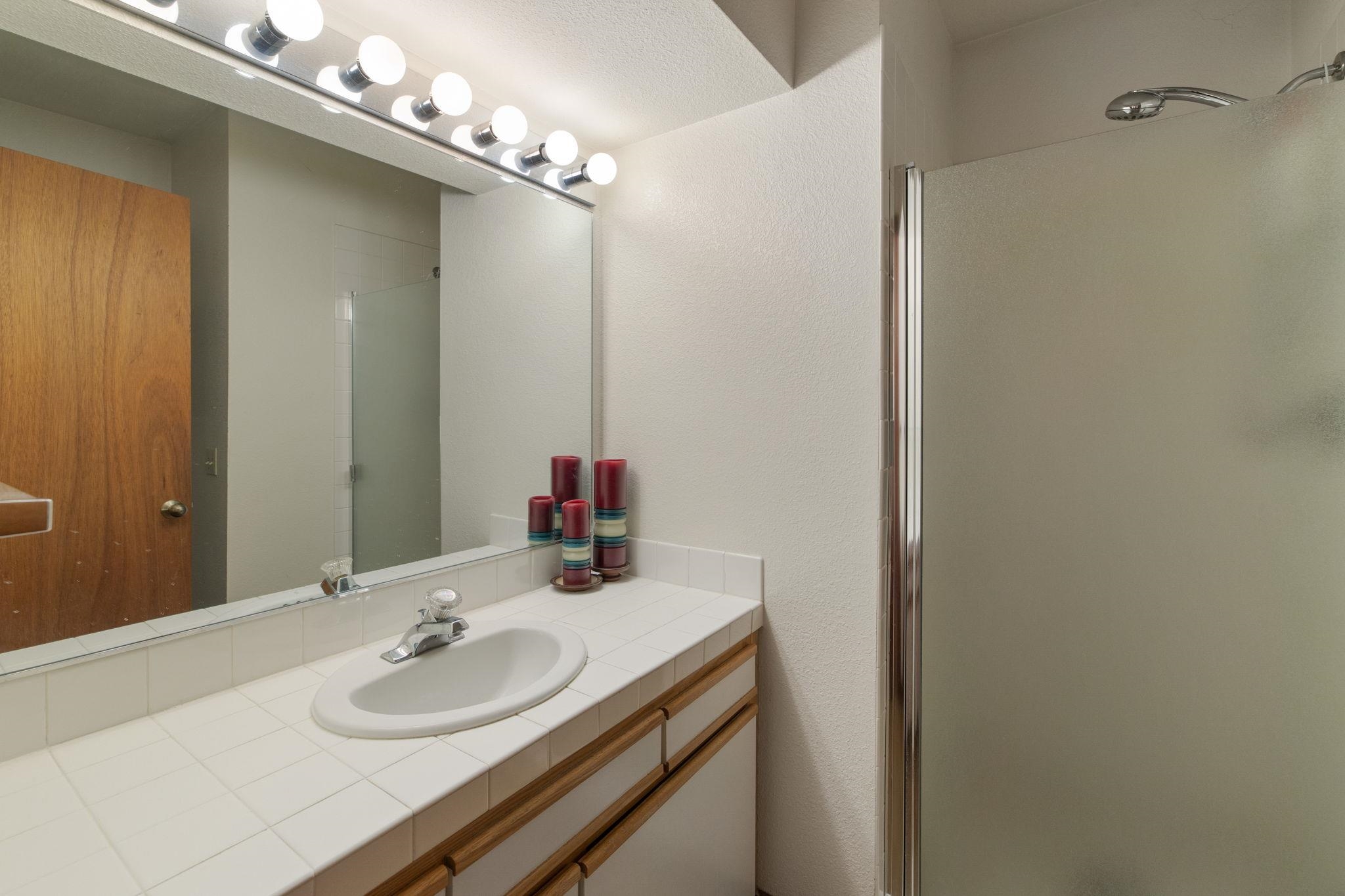 1591 Olympic Vly Road, Unit 29 Olympic Valley, CA 96146 - Photo 19 of 28 a bathroom with a sink and a mirror