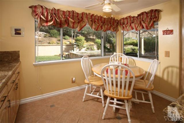 554 Innwood Road Simi Valley, CA 93065 - Photo 11 of 23 a view of a dining room with furniture window and outside view