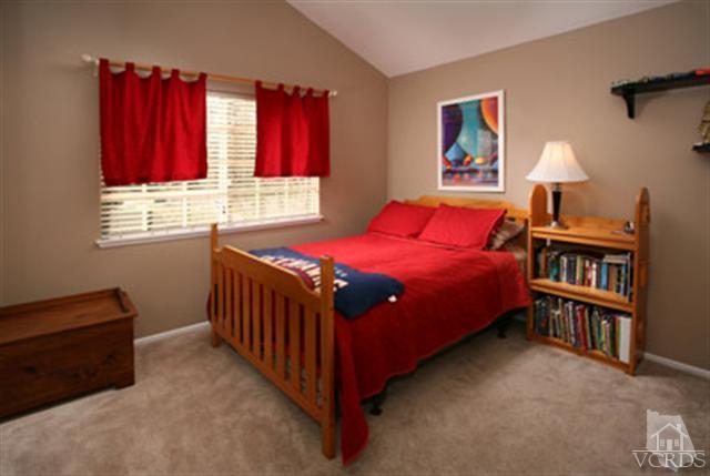 554 Innwood Road Simi Valley, CA 93065 - Photo 14 of 23 a bedroom with a bed furniture and a window