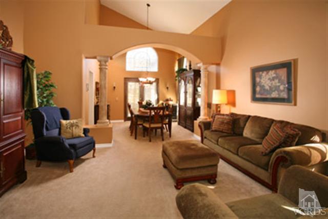 554 Innwood Road Simi Valley, CA 93065 - Photo 4 of 23 a living room with furniture and a large window