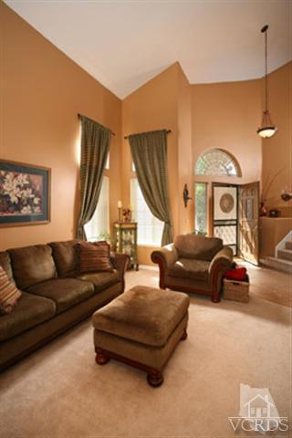 554 Innwood Road Simi Valley, CA 93065 - Photo 5 of 23 a living room with furniture and a large window