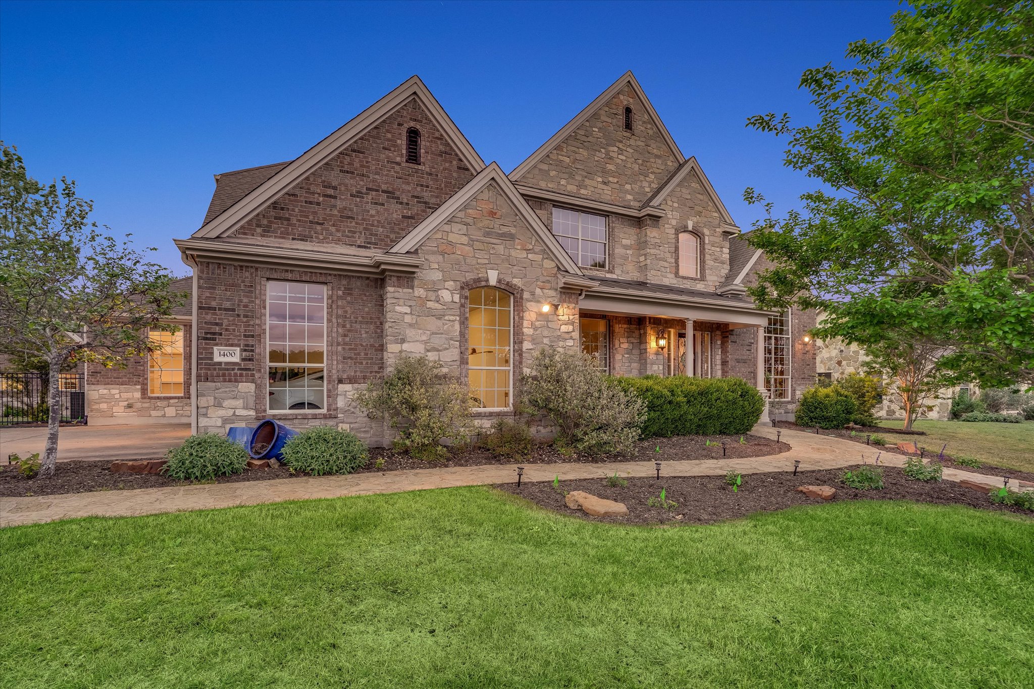 1400 Tom Sawyer Road Austin, TX 78737 - Photo 1 of 40 Custom home on 1.2+ acres in the Sawyer Ranch area of Dripping Springs ISD, just minutes from Southwest Austin.