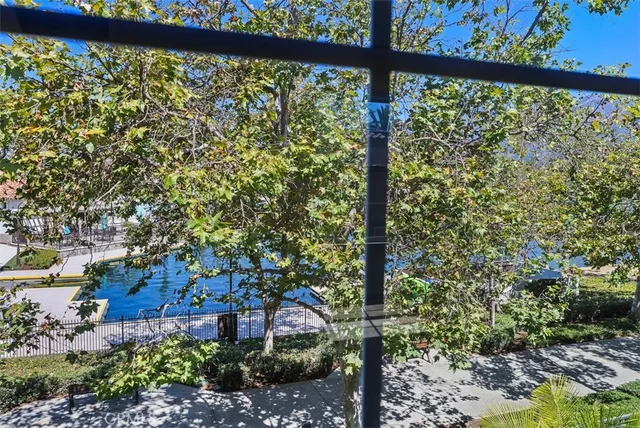 a view of a city street from a balcony