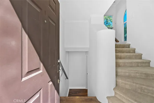 a view of entryway with a front door