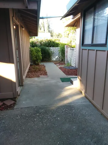 a view of a terrace with trees