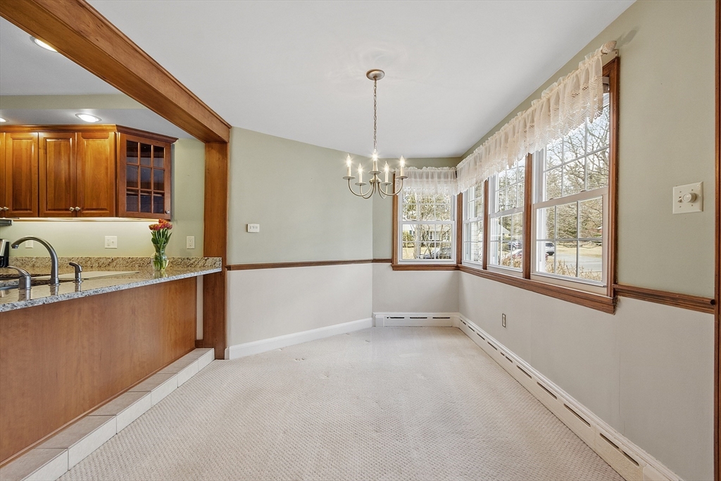 38 Knower Road Westminster, MA 01473 - Photo 5 of 24 a view of a kitchen with a sink and windows