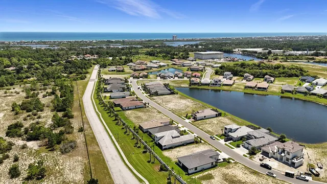 an aerial view of a house with swimming pool