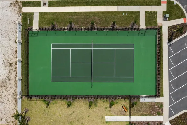 wooden floor with a window in a room