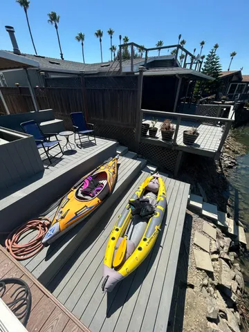 a large white kitchen with a large window