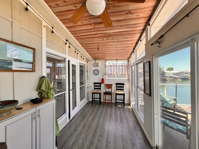 a dining room with furniture window wooden floor