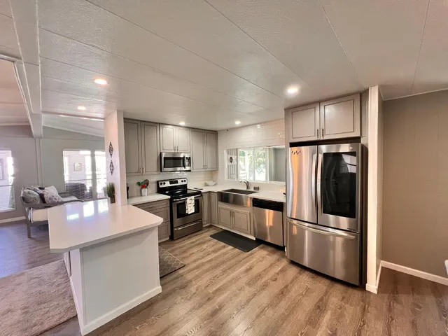 a bedroom with a bed and a furniture