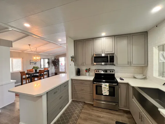 a bathroom with a shower and a sink