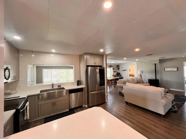 a bathroom with a sink vanity and mirror