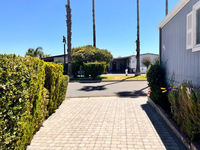a view of a swimming pool with an outdoor seating