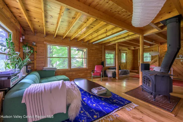 a view of a backyard with swimming pool