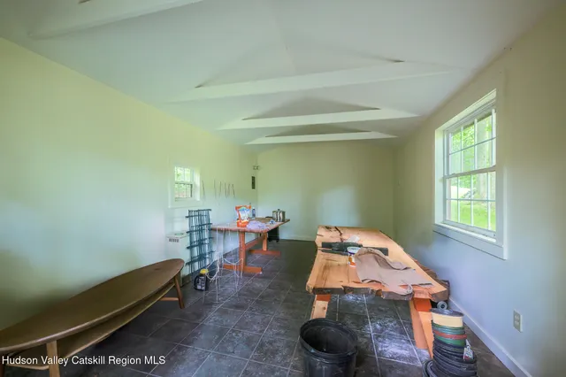 a room with furniture and a window