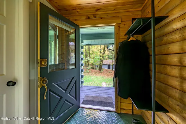 a view of balcony and wooden floor