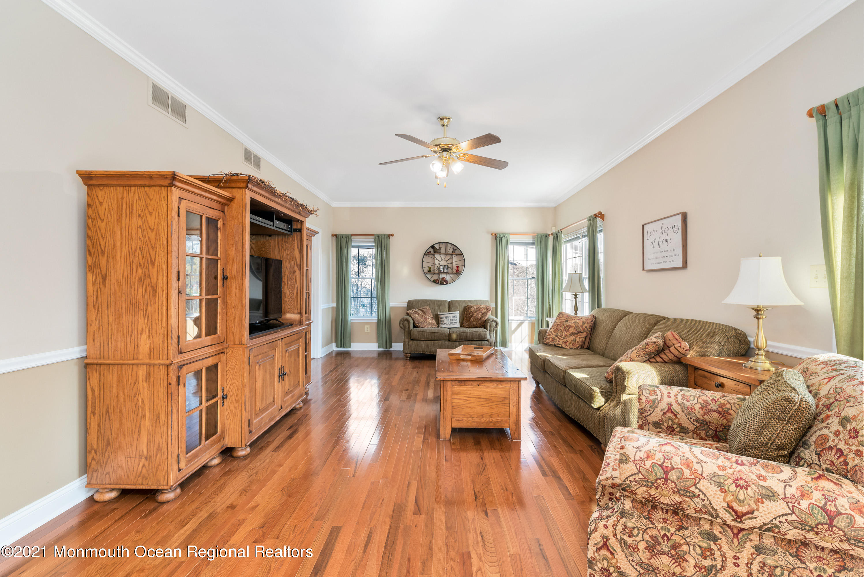 11 Grindstone Road Howell, NJ 07731 - Photo 12 of 45 a living room with furniture and wooden floor