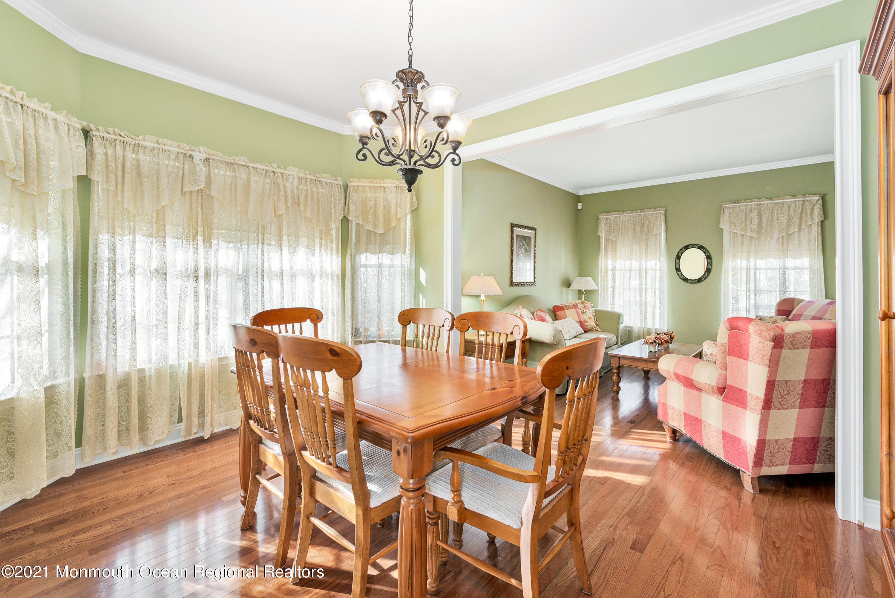 11 Grindstone Road Howell, NJ 07731 - Photo 18 of 45 a view of a dining room with furniture wooden floor and chandelier