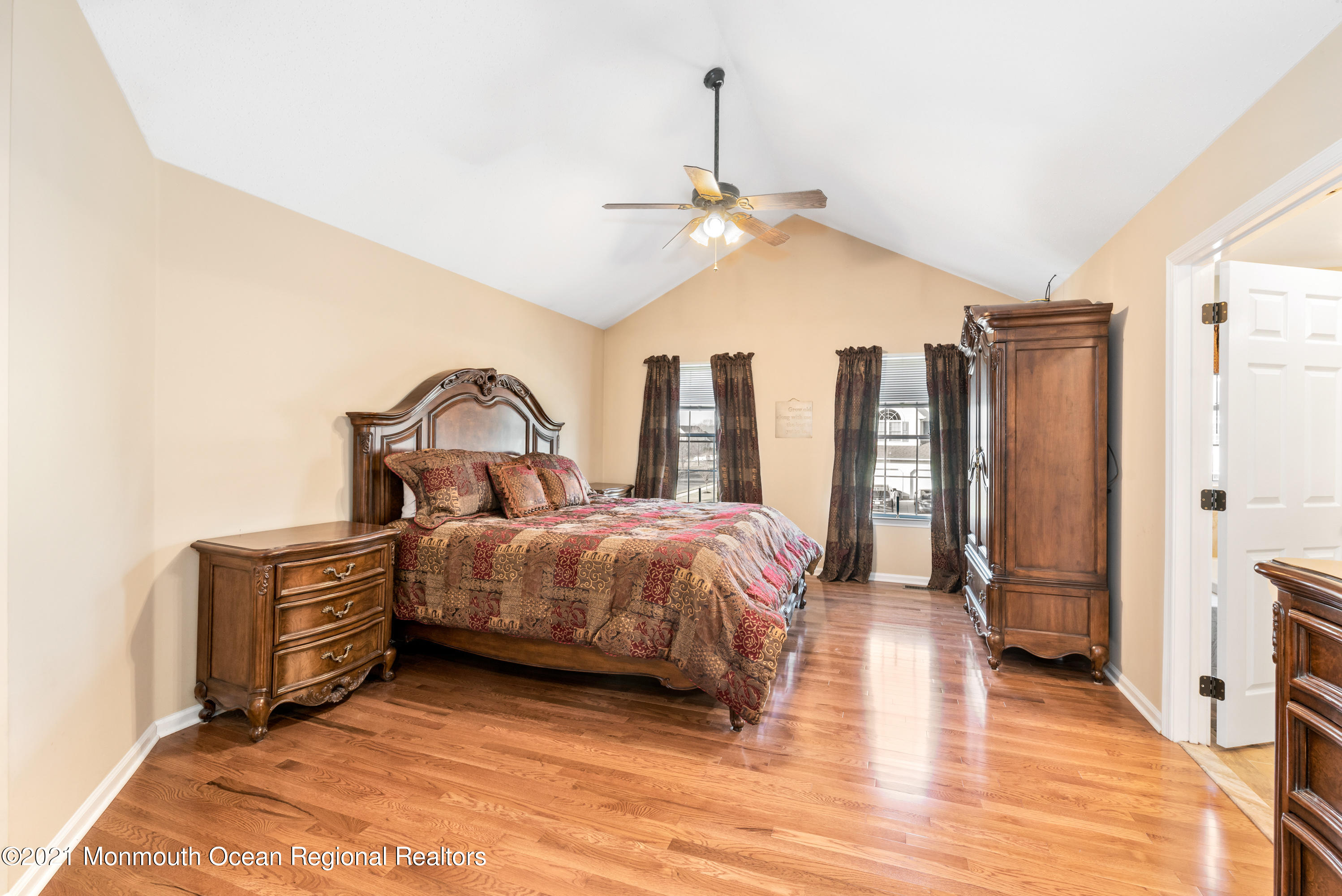11 Grindstone Road Howell, NJ 07731 - Photo 23 of 45 a spacious bedroom with a bed dresser and a window