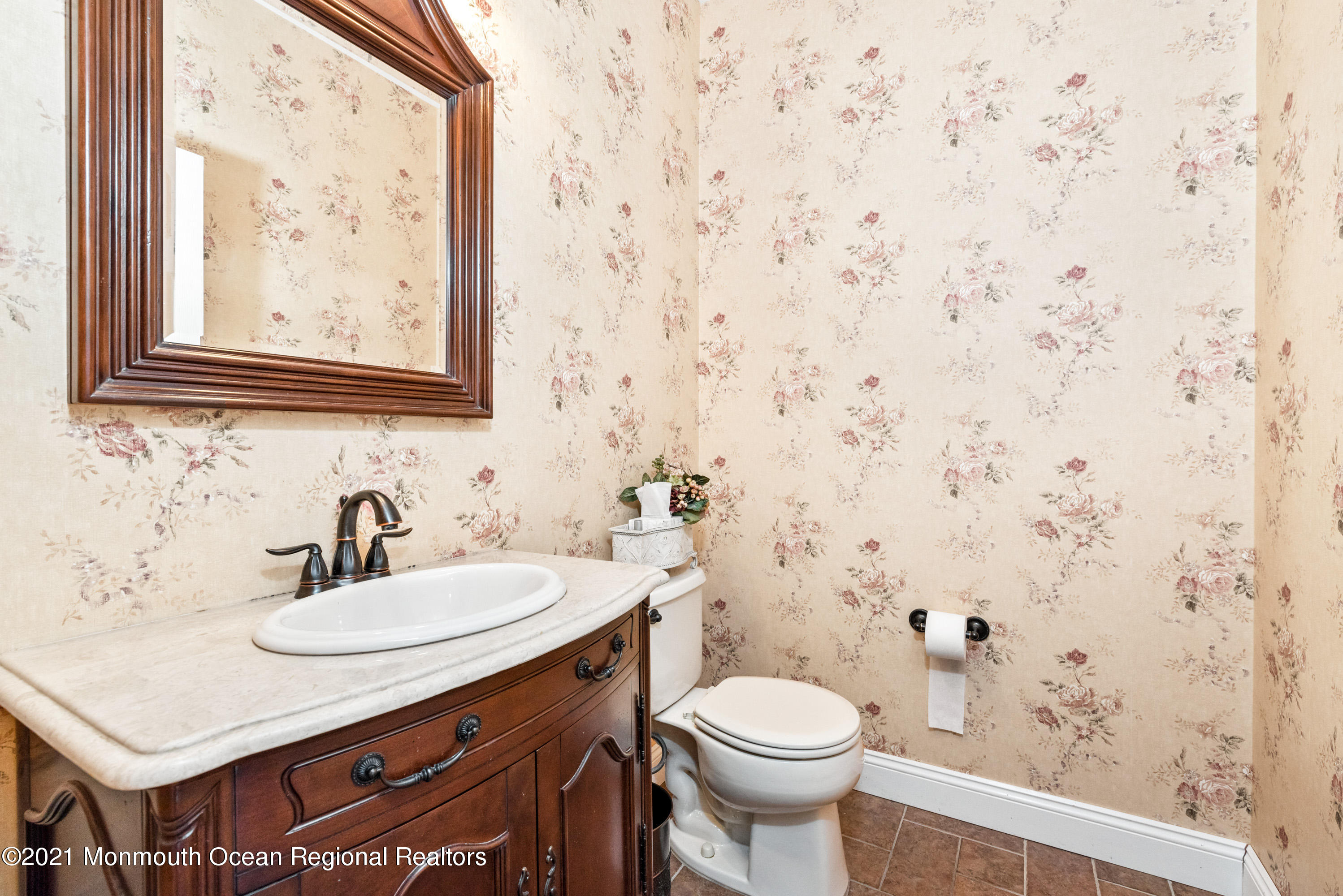11 Grindstone Road Howell, NJ 07731 - Photo 27 of 45 a bathroom with a sink and a toilet