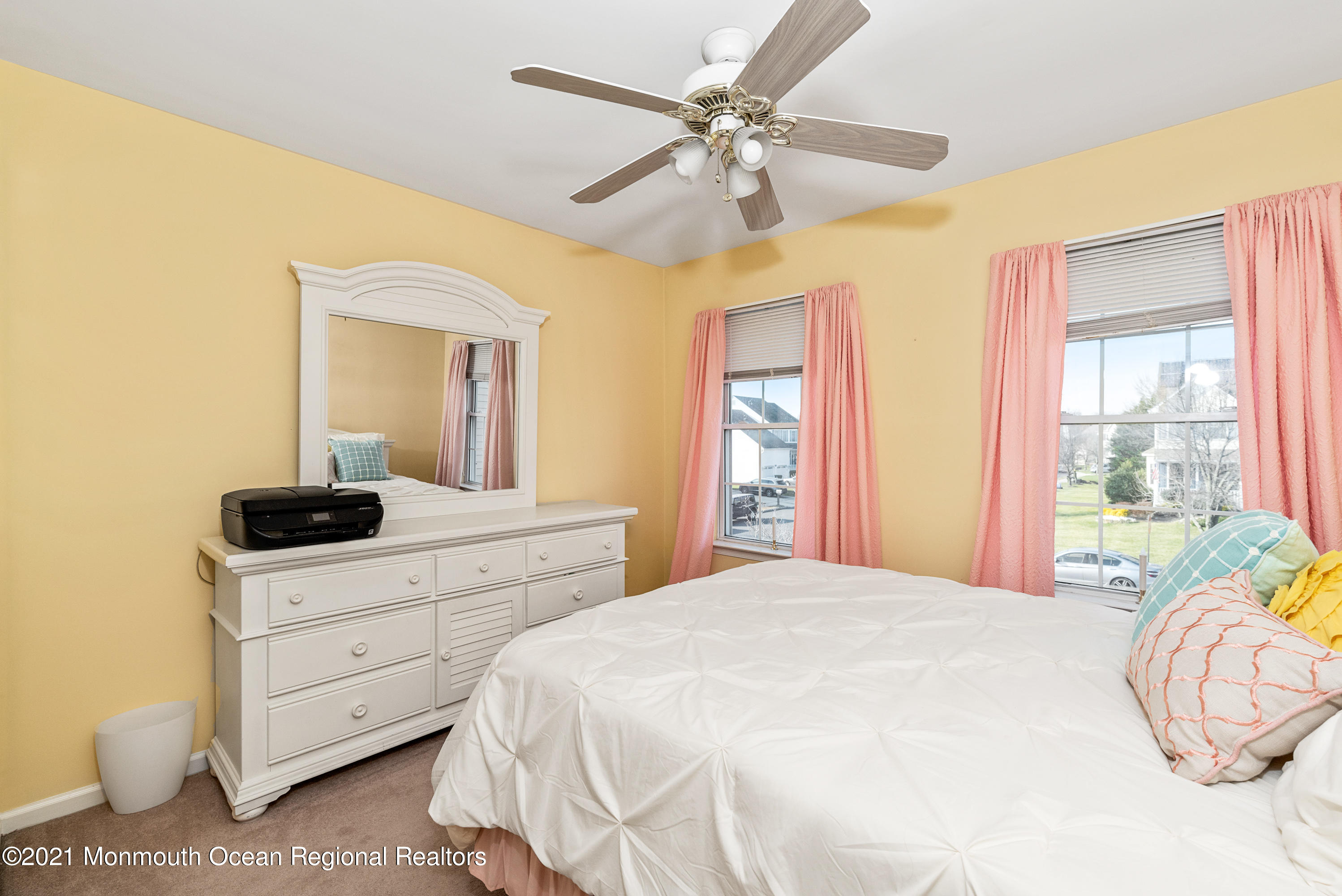 11 Grindstone Road Howell, NJ 07731 - Photo 30 of 45 a bedroom with a bed and a dresser