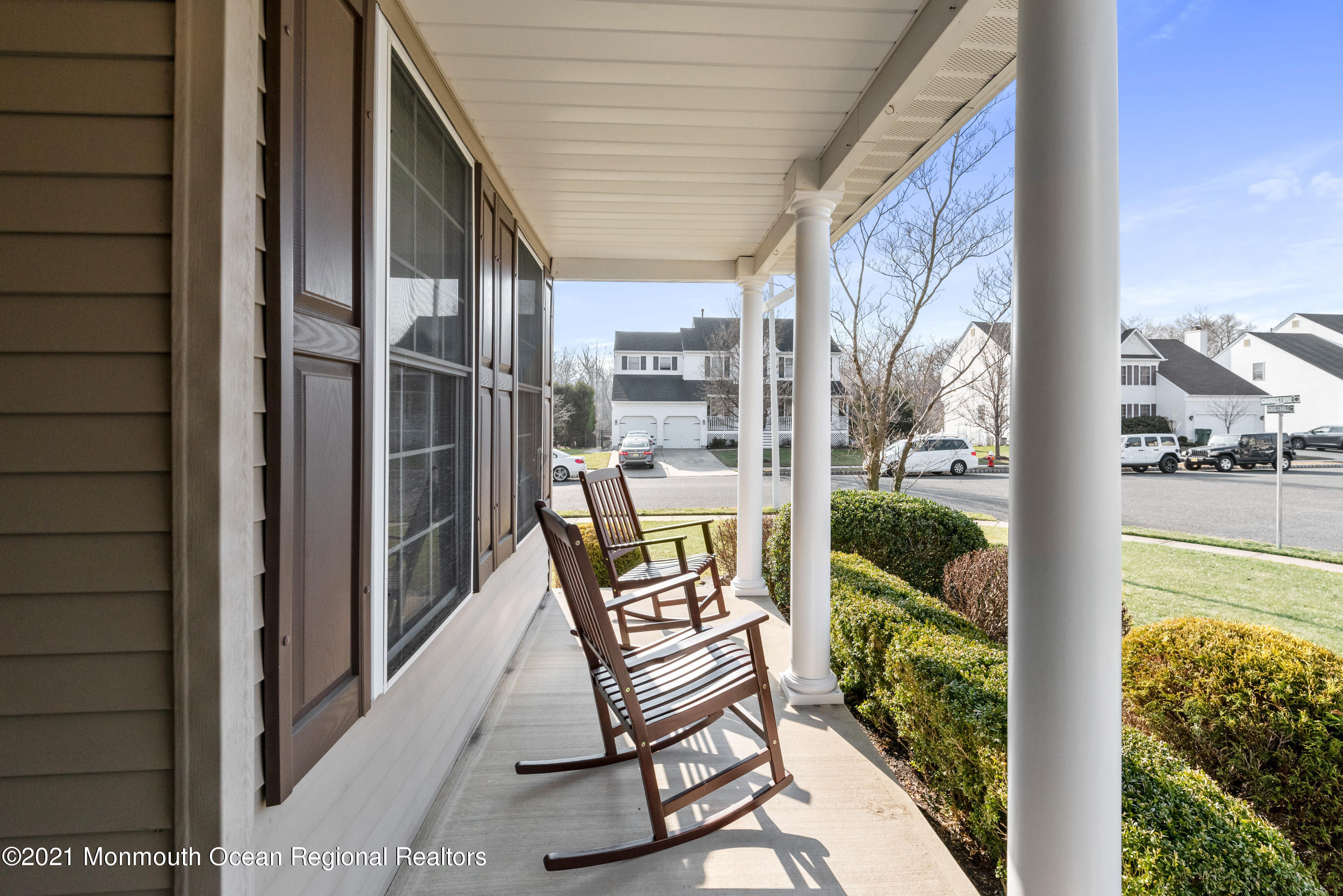 11 Grindstone Road Howell, NJ 07731 - Photo 4 of 45 a view of a balcony with chairs and wooden floor