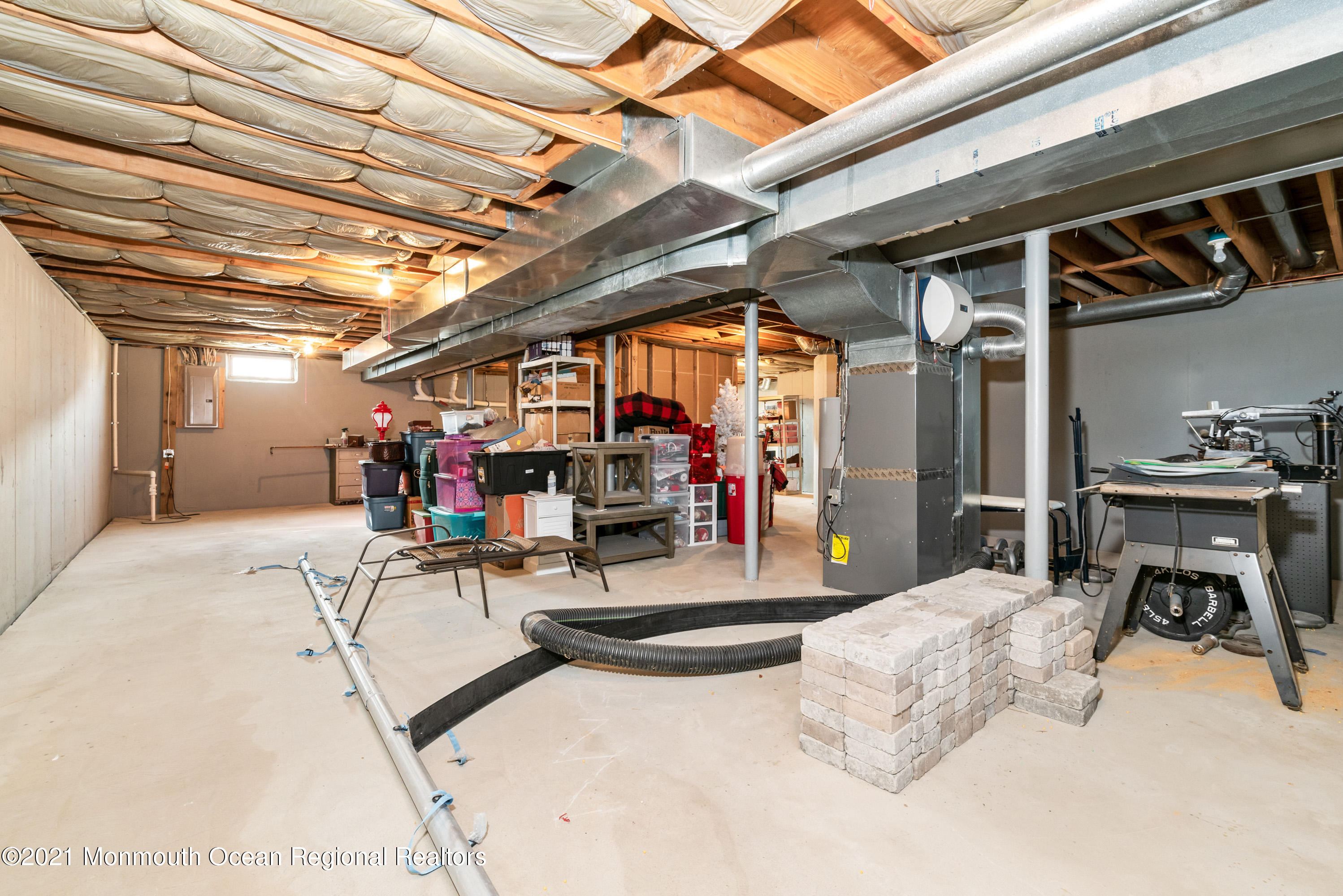 11 Grindstone Road Howell, NJ 07731 - Photo 38 of 45 a view of a room with gym equipment