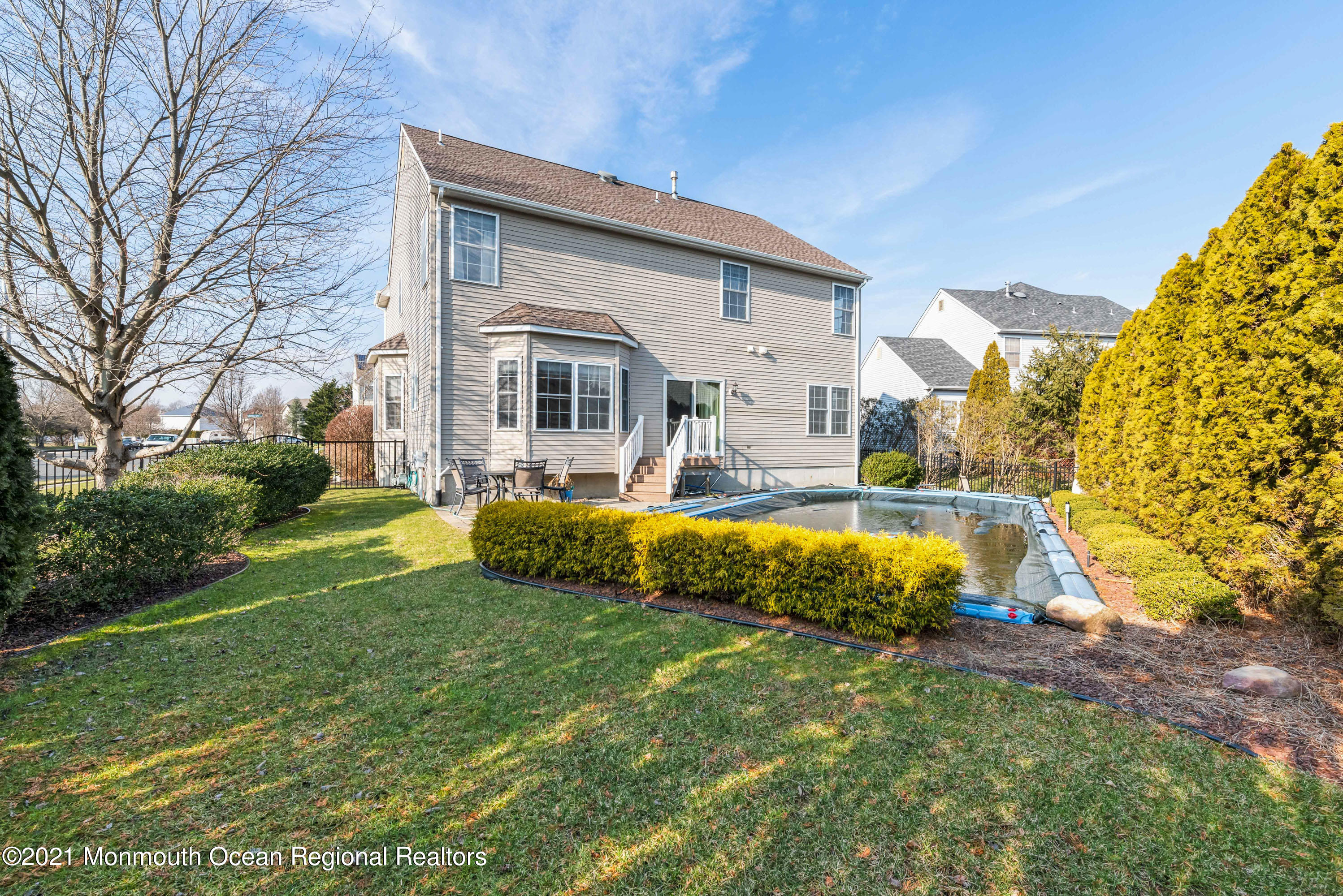 11 Grindstone Road Howell, NJ 07731 - Photo 39 of 45 a view of a house with swimming pool and yard