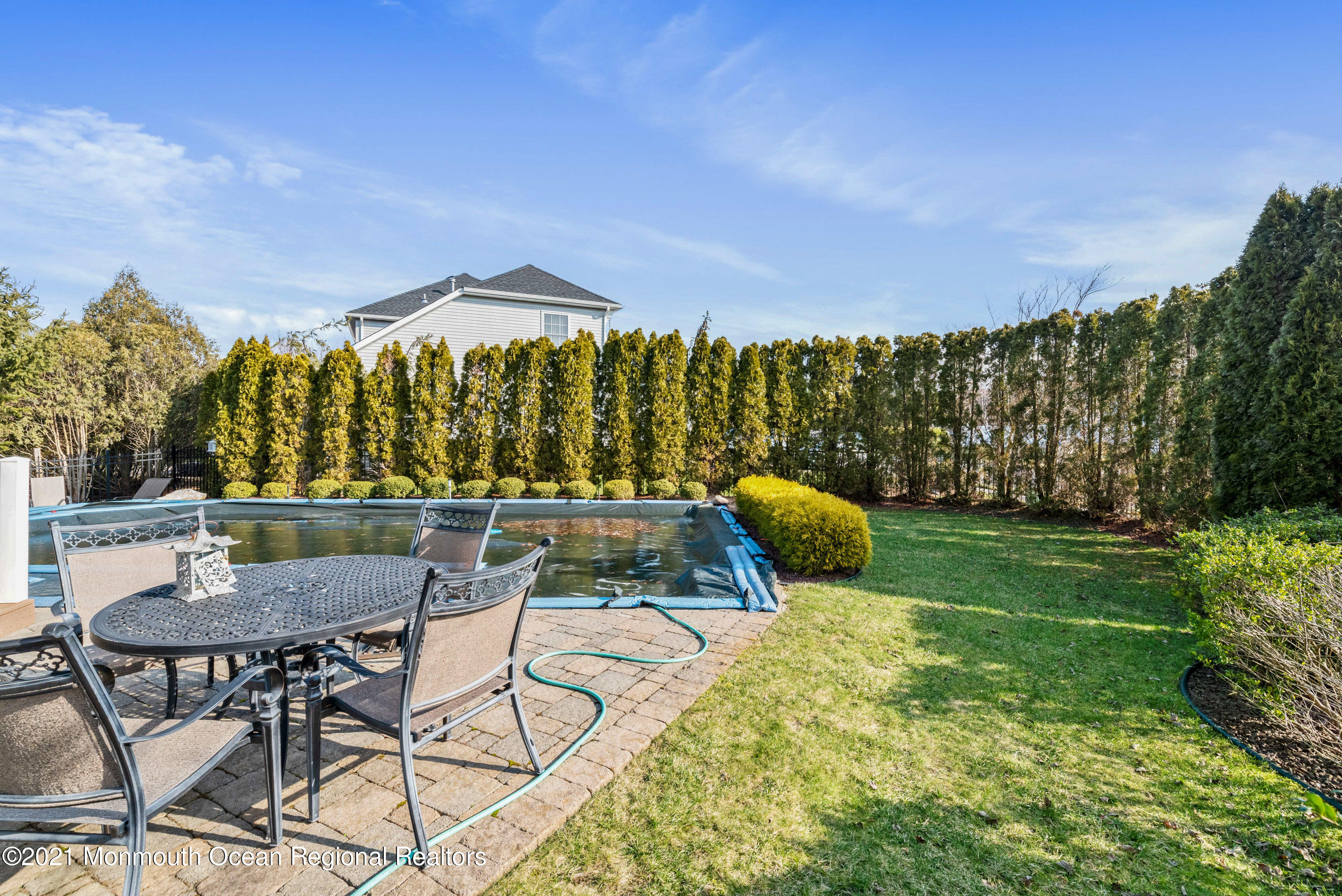 11 Grindstone Road Howell, NJ 07731 - Photo 41 of 45 a view of a chairs and table in patio