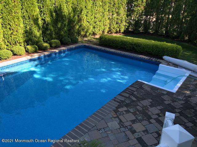 11 Grindstone Road Howell, NJ 07731 - Photo 42 of 45 a view of a yard with an outdoor space