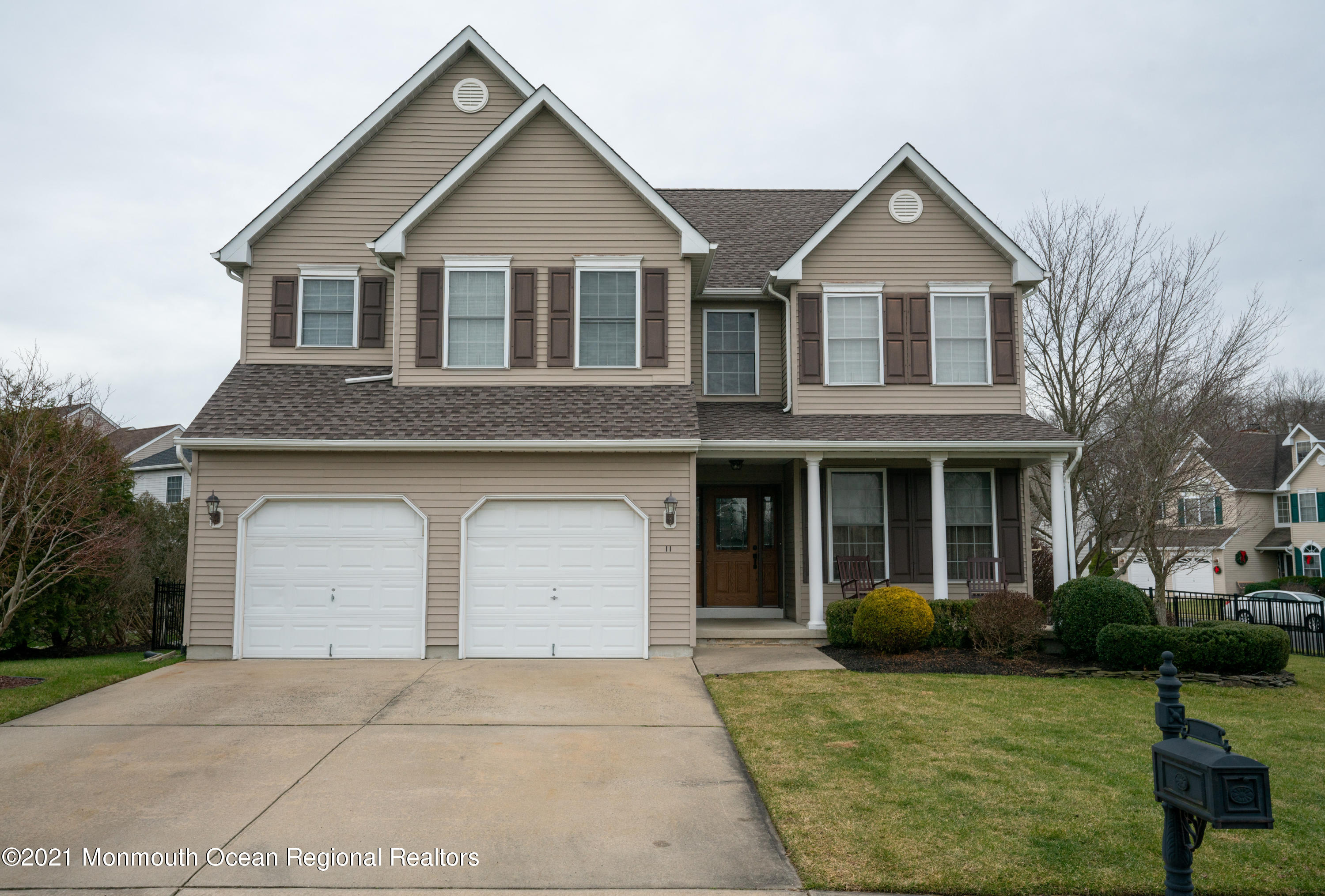 11 Grindstone Road Howell, NJ 07731 - Photo 45 of 45 a front view of a house with a yard