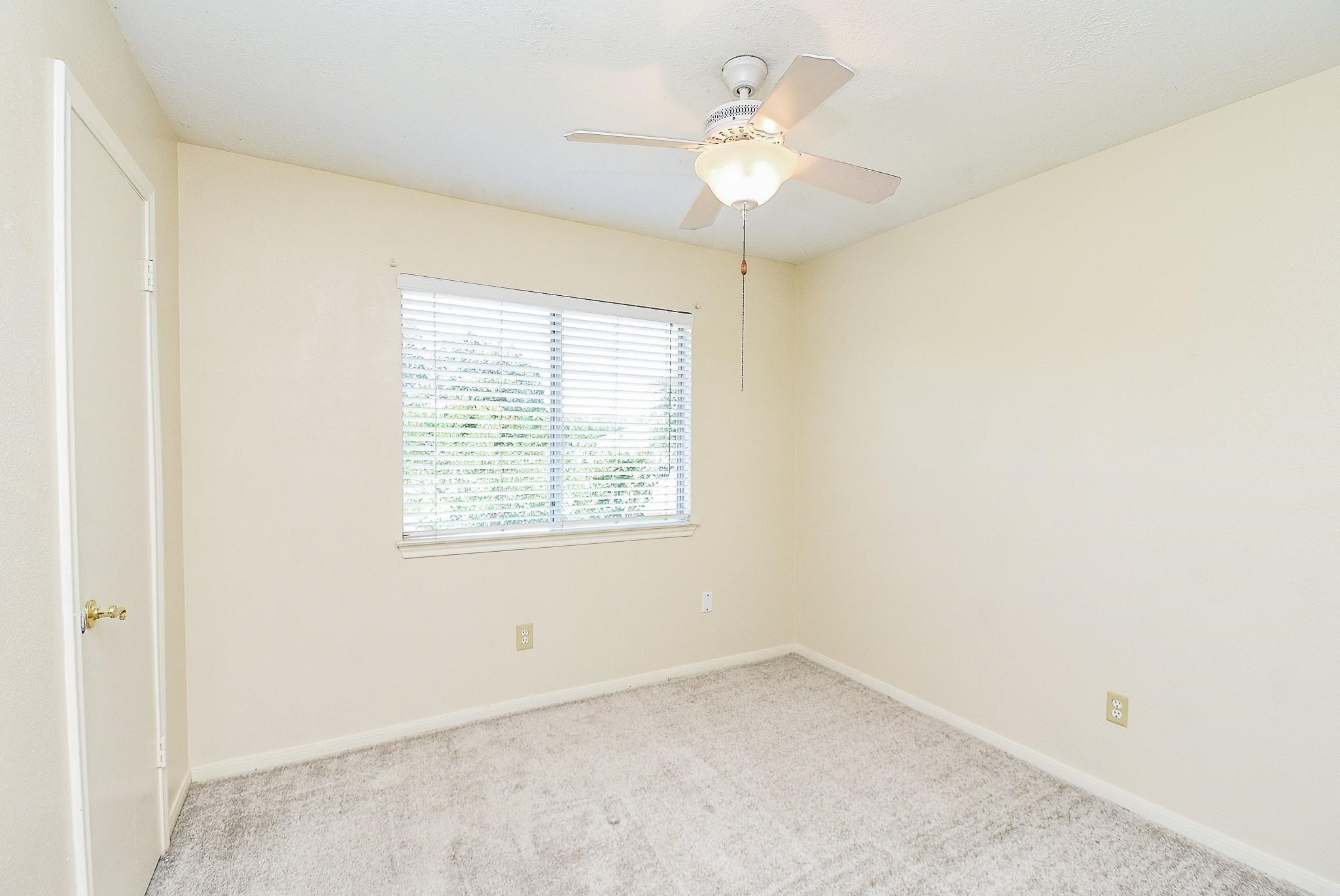 2623 Forestbrook Drive Spring, TX 77373 - Photo 18 of 27 an empty room with a window