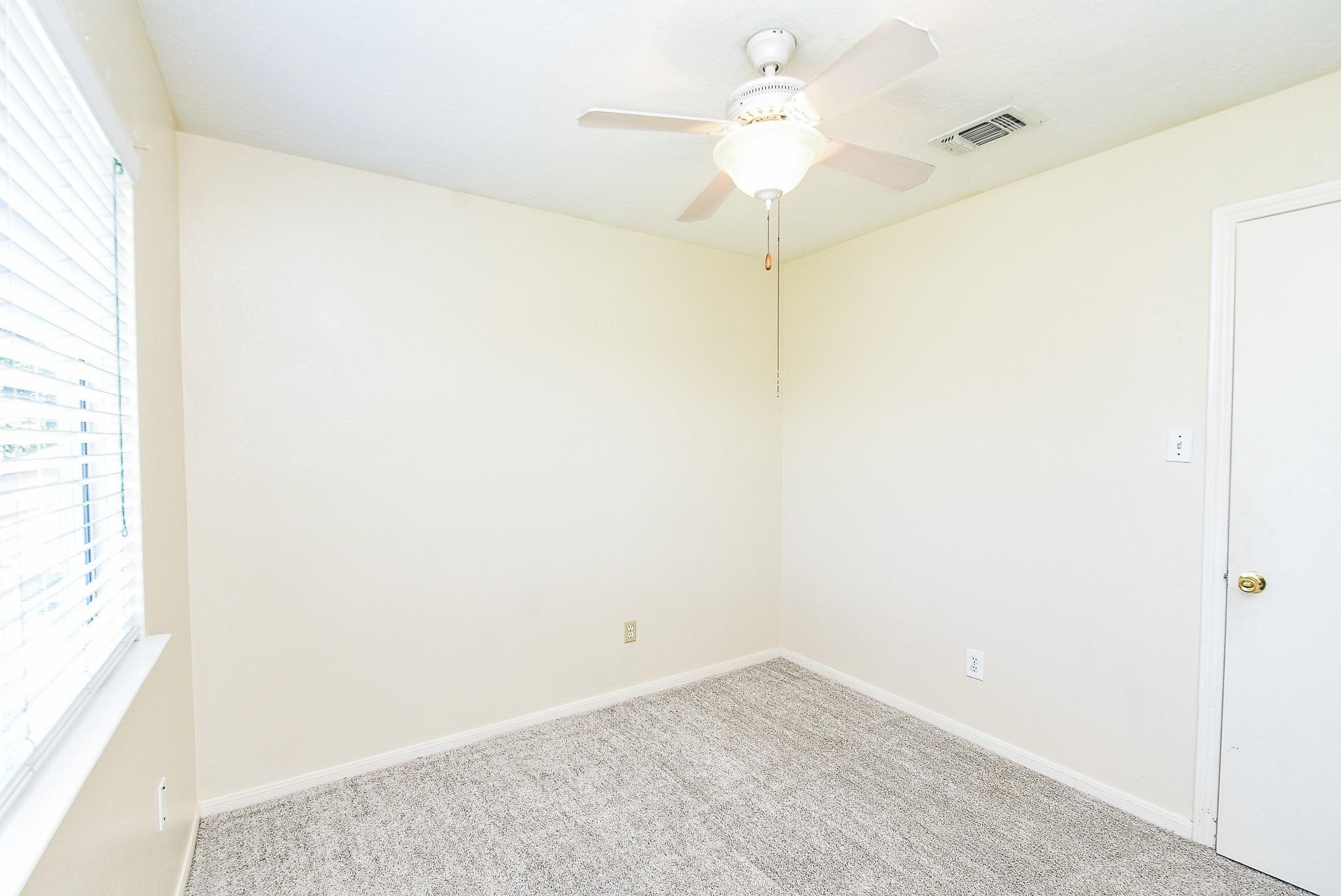 2623 Forestbrook Drive Spring, TX 77373 - Photo 19 of 27 a view of small space with a ceiling fan