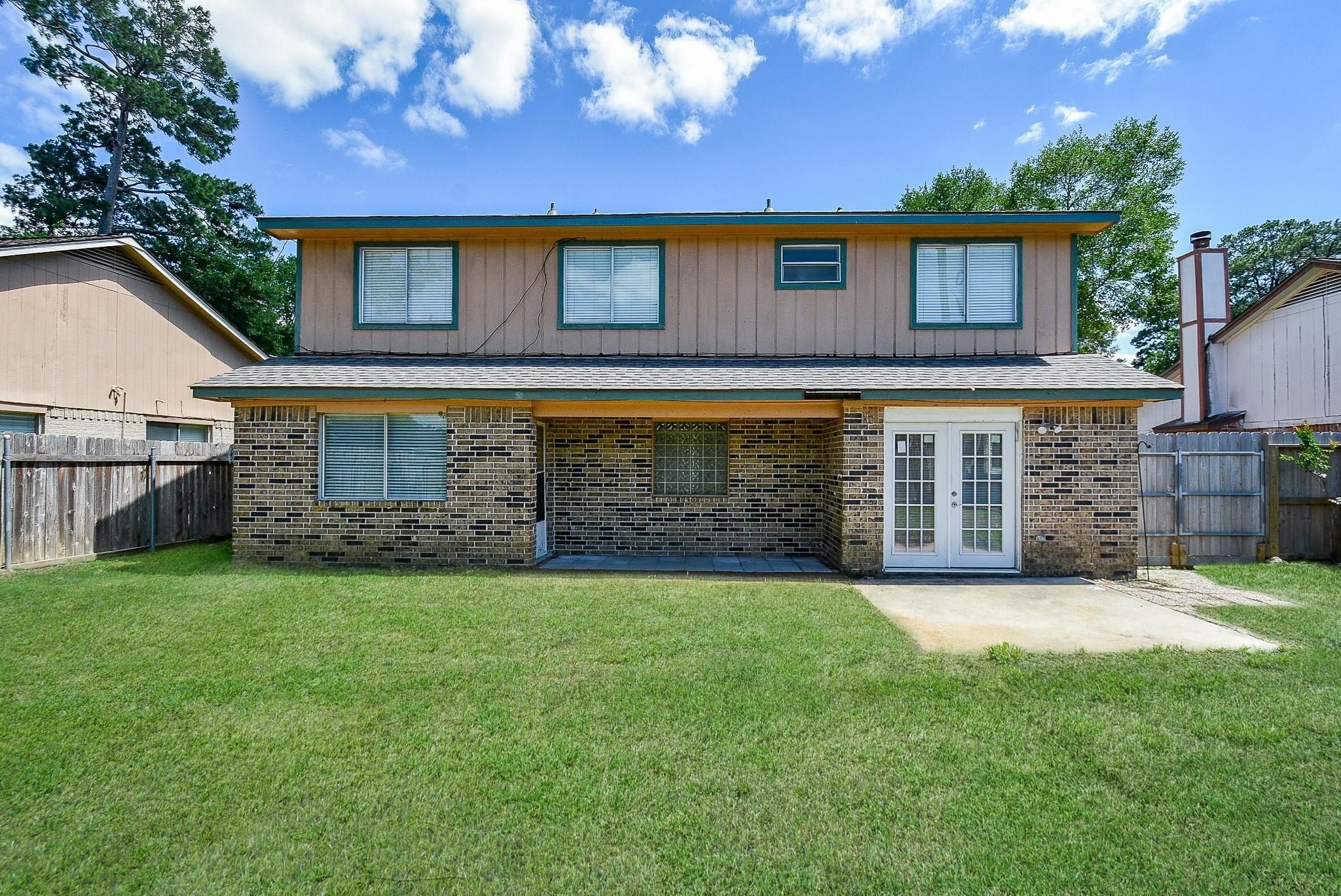 2623 Forestbrook Drive Spring, TX 77373 - Photo 27 of 27 a view of a house with a yard