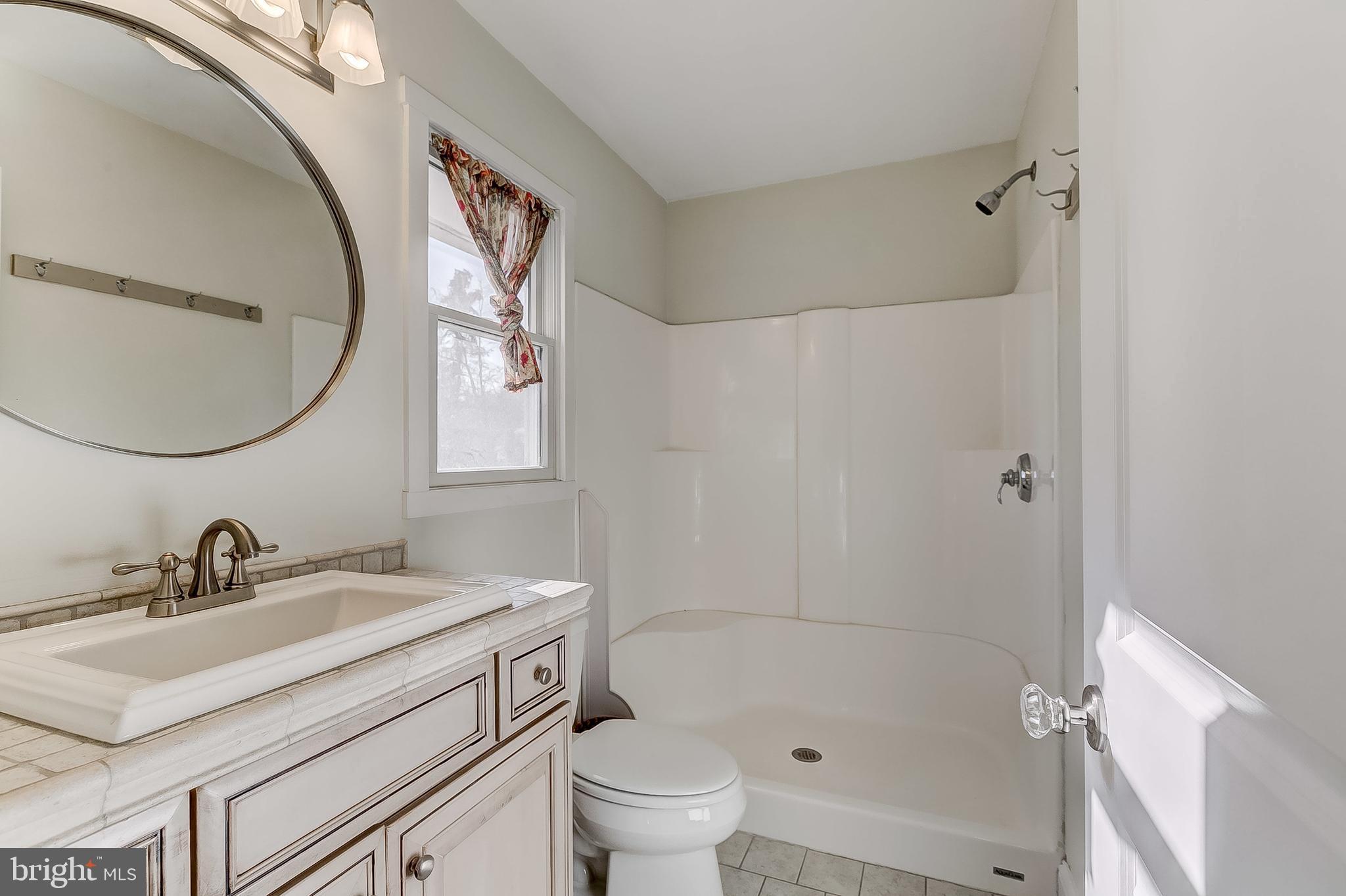 7841 Tick Neck Road Pasadena, MD 21122 - Photo 41 of 63 Bathroom