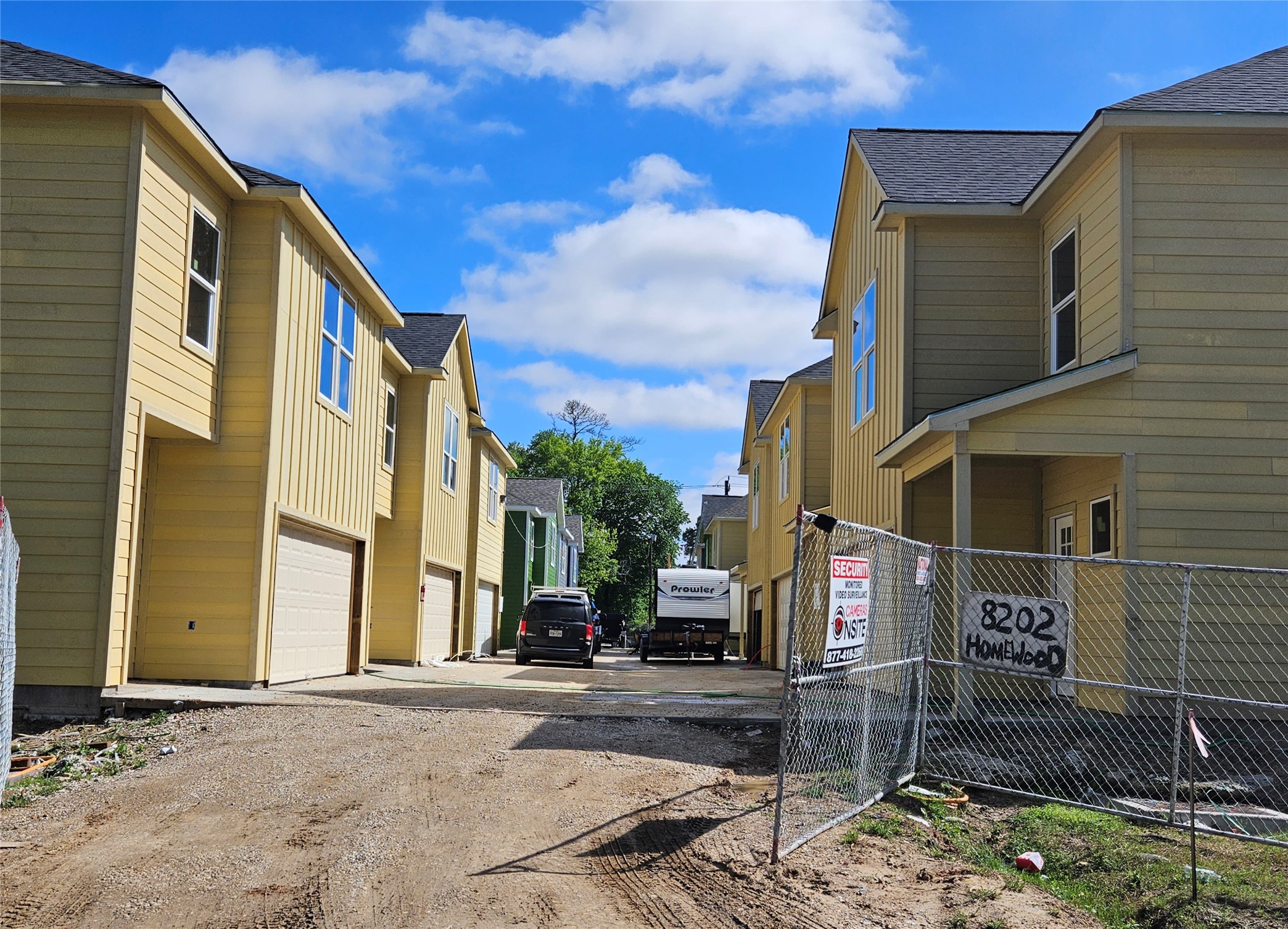 0 Snowden Street Houston, TX 77028 - Photo 4 of 6 a street sign on a sidewalk next to a building