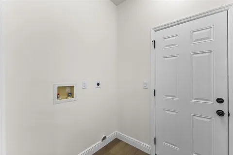 a view of a room with racks on the wall