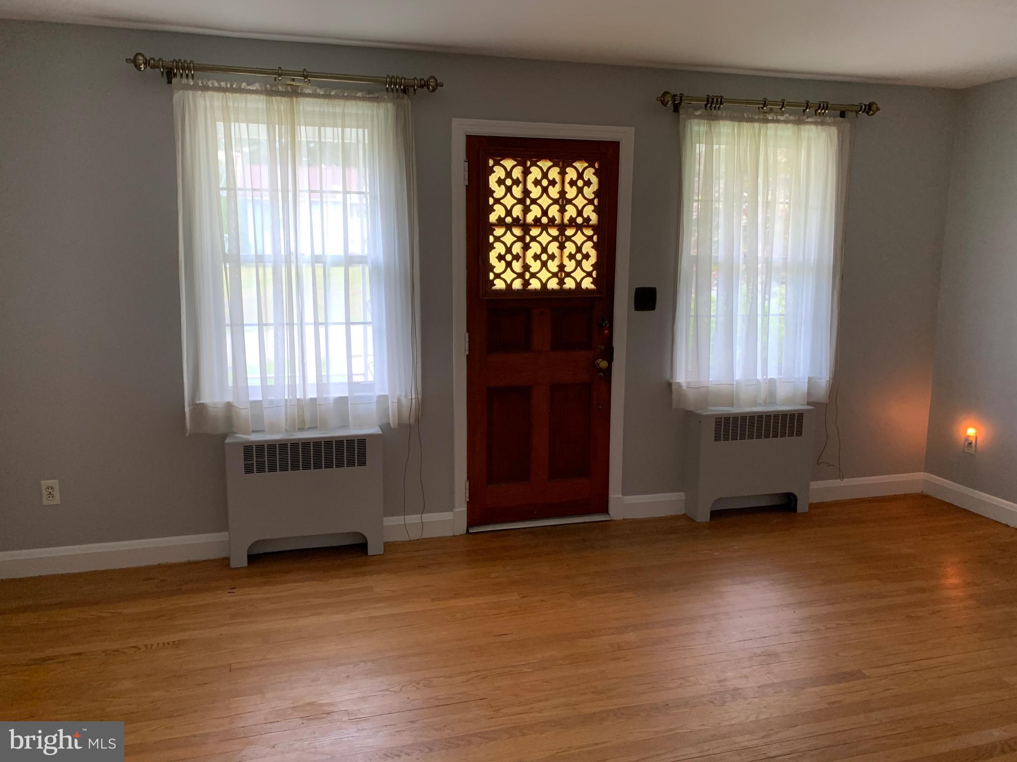 205 Delight Road Reisterstown, MD 21136 - Photo 2 of 26 Living Room with Decorative Front Door