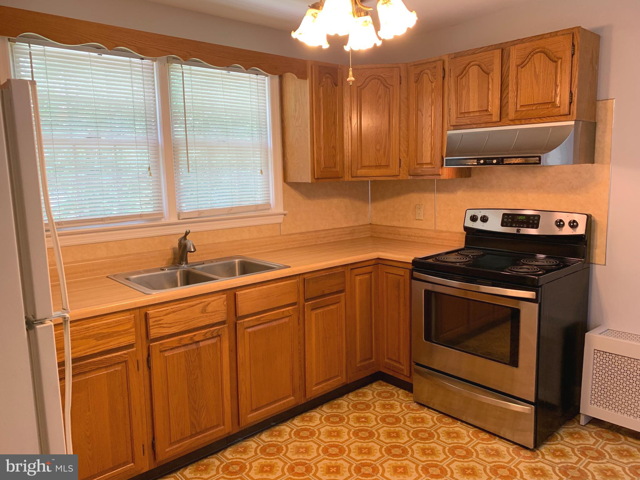 205 Delight Road Reisterstown, MD 21136 - Photo 5 of 26 Eat-in kitchen with oak cabinets