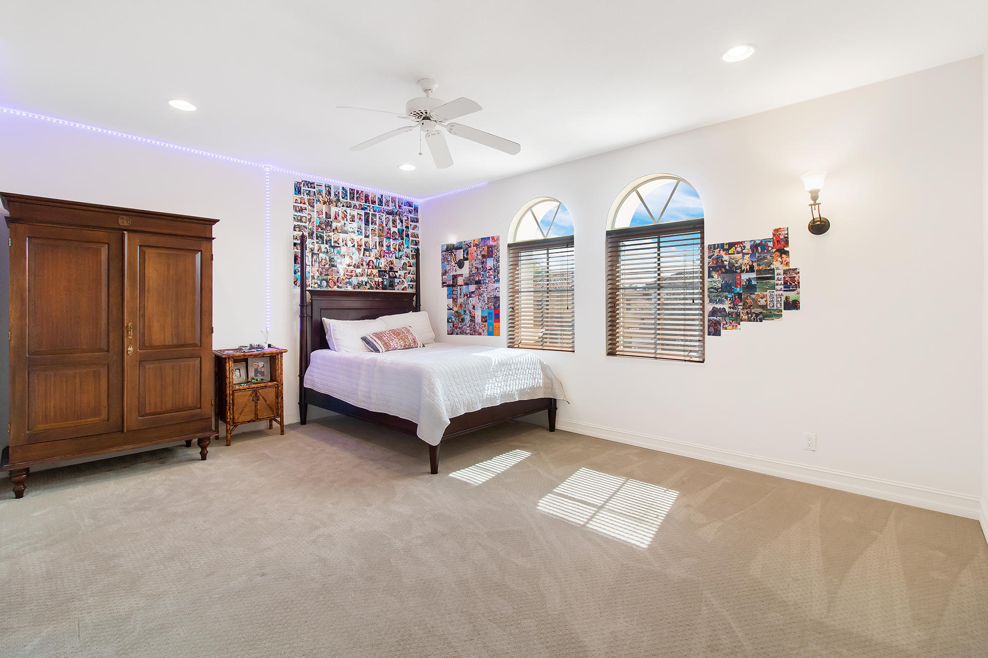 17562 Middlebrook Way Boca Raton, FL 33496 - Photo 29 of 82 a spacious bedroom with a bed ceiling fan and a window