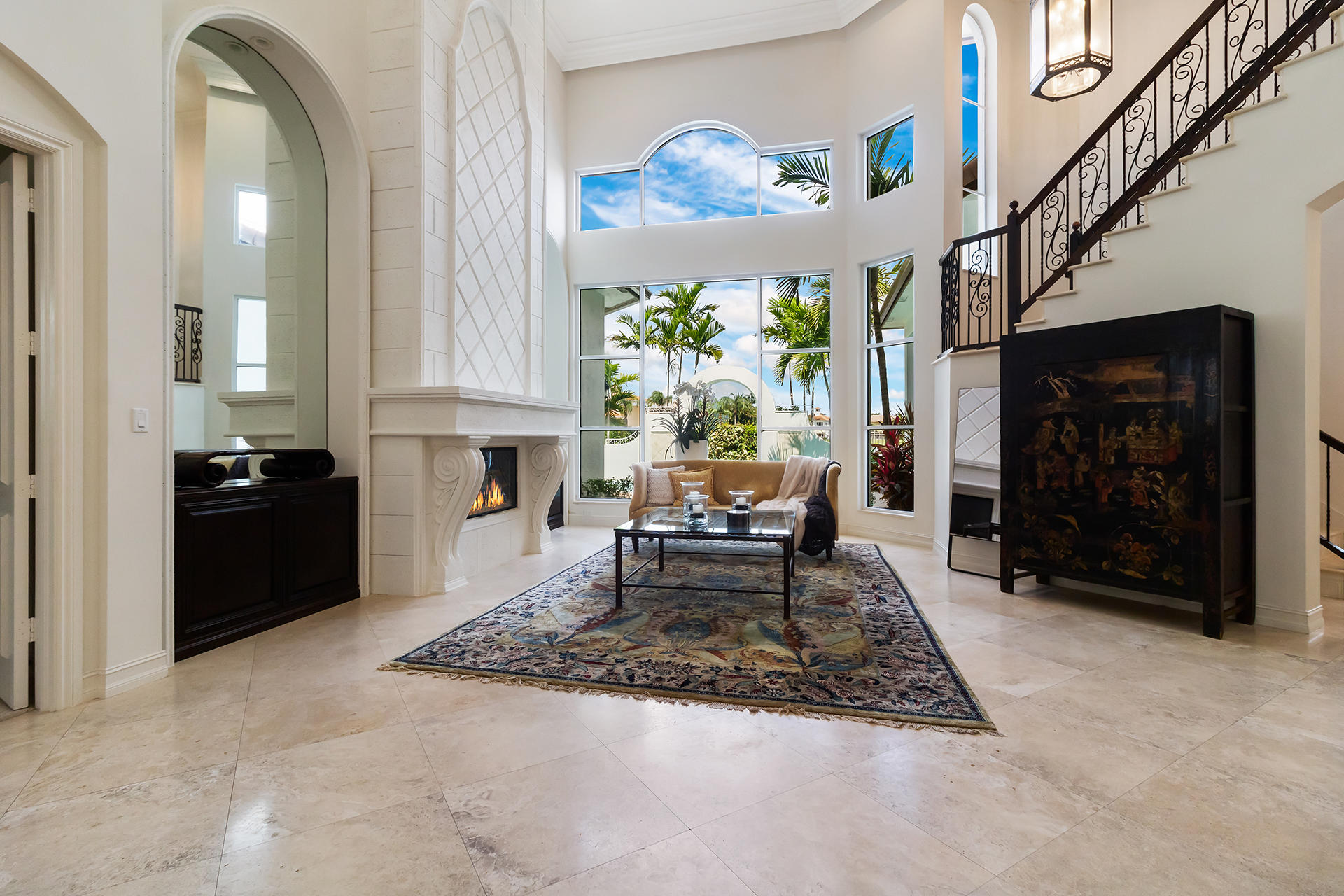 17562 Middlebrook Way Boca Raton, FL 33496 - Photo 5 of 82 a living room with furniture a fireplace and a potted plant
