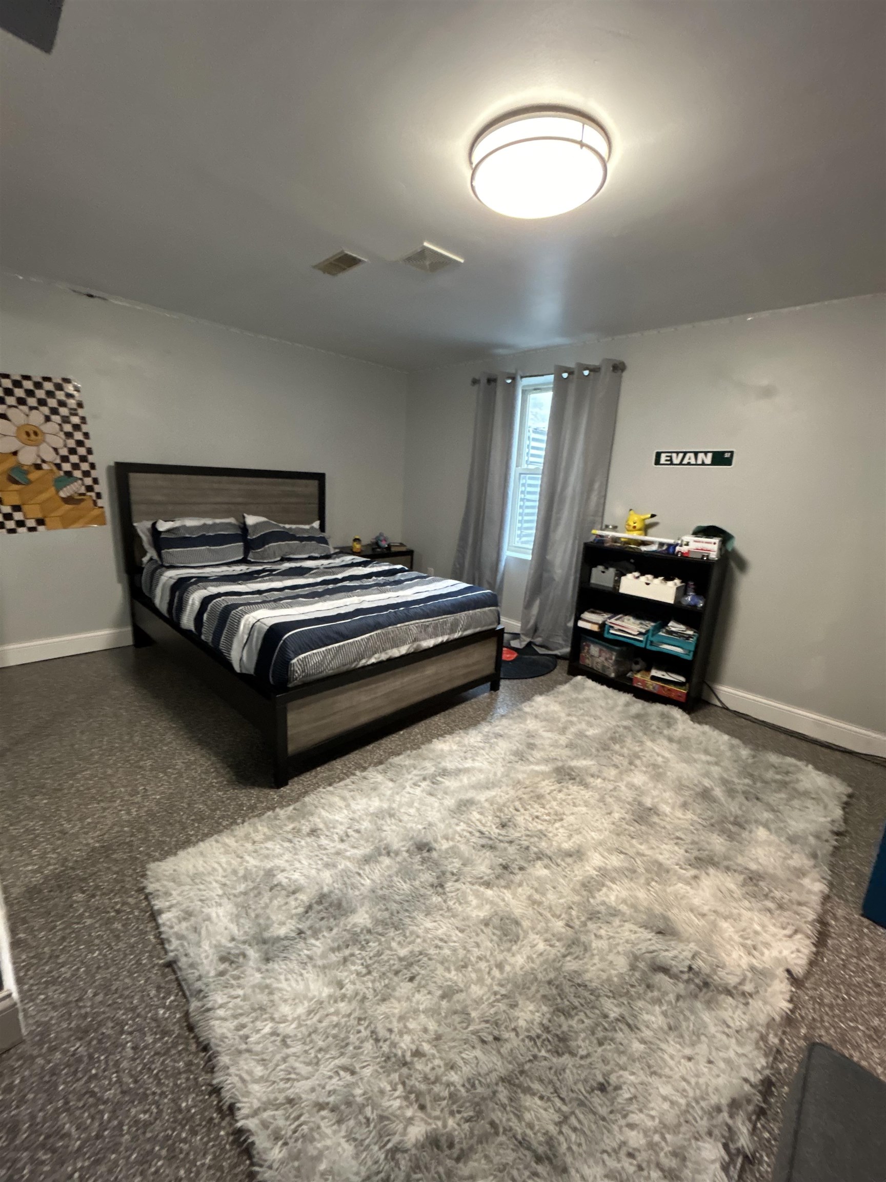 4563 Sunderman Road Rockford, IL 61114 - Photo 16 of 70 a bedroom with bed and window