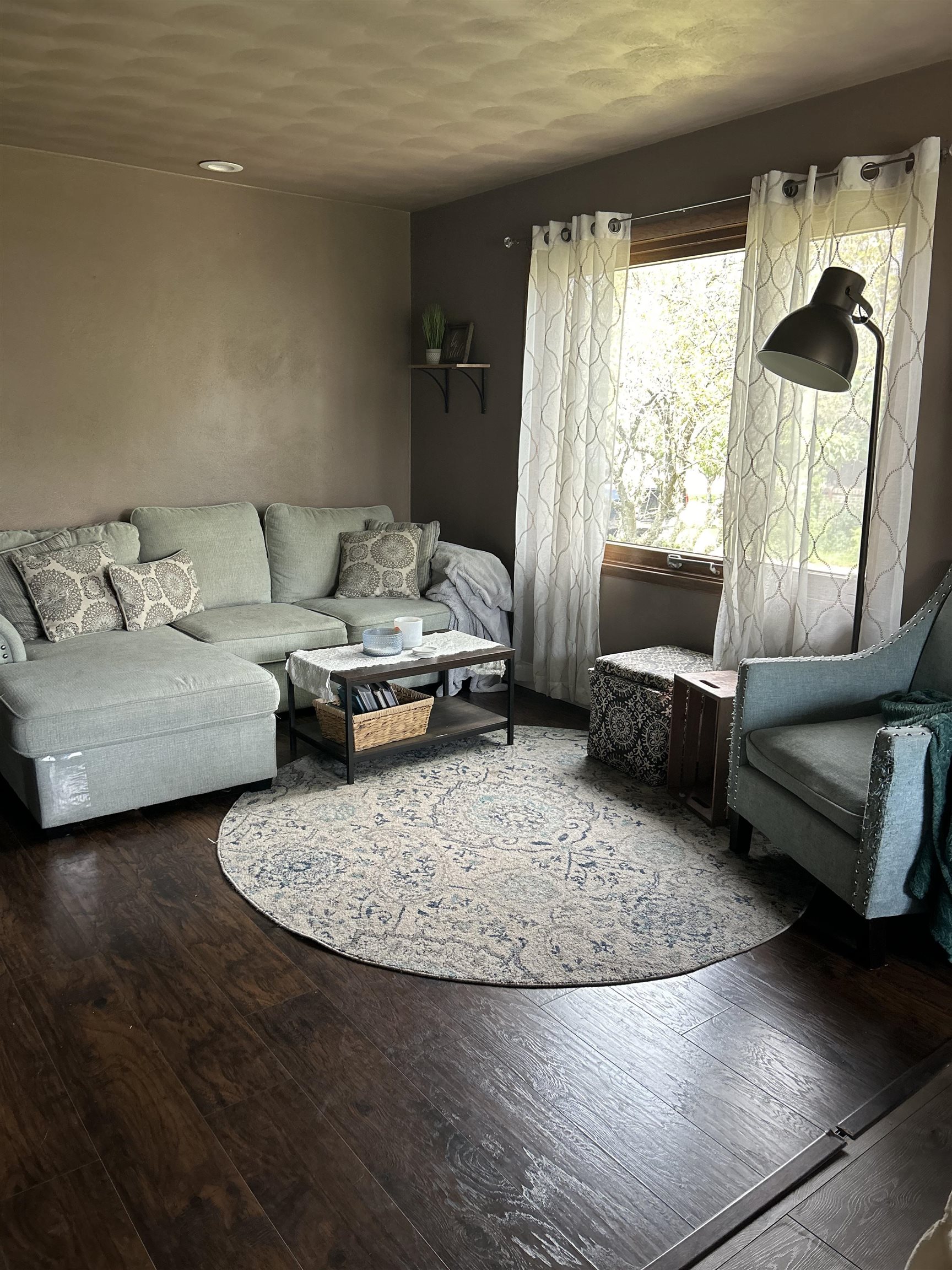 4563 Sunderman Road Rockford, IL 61114 - Photo 30 of 70 a living room with furniture and a large window